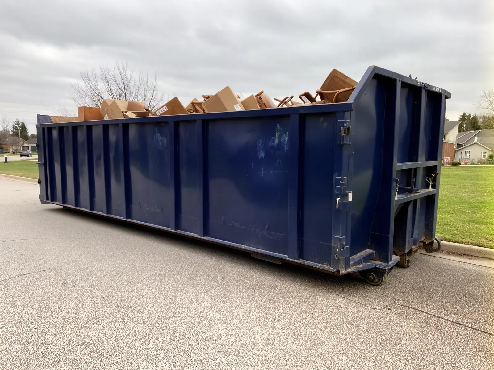 Roll-off dumpster from Michel Brothers Dumpster Rental in Lake City, FL